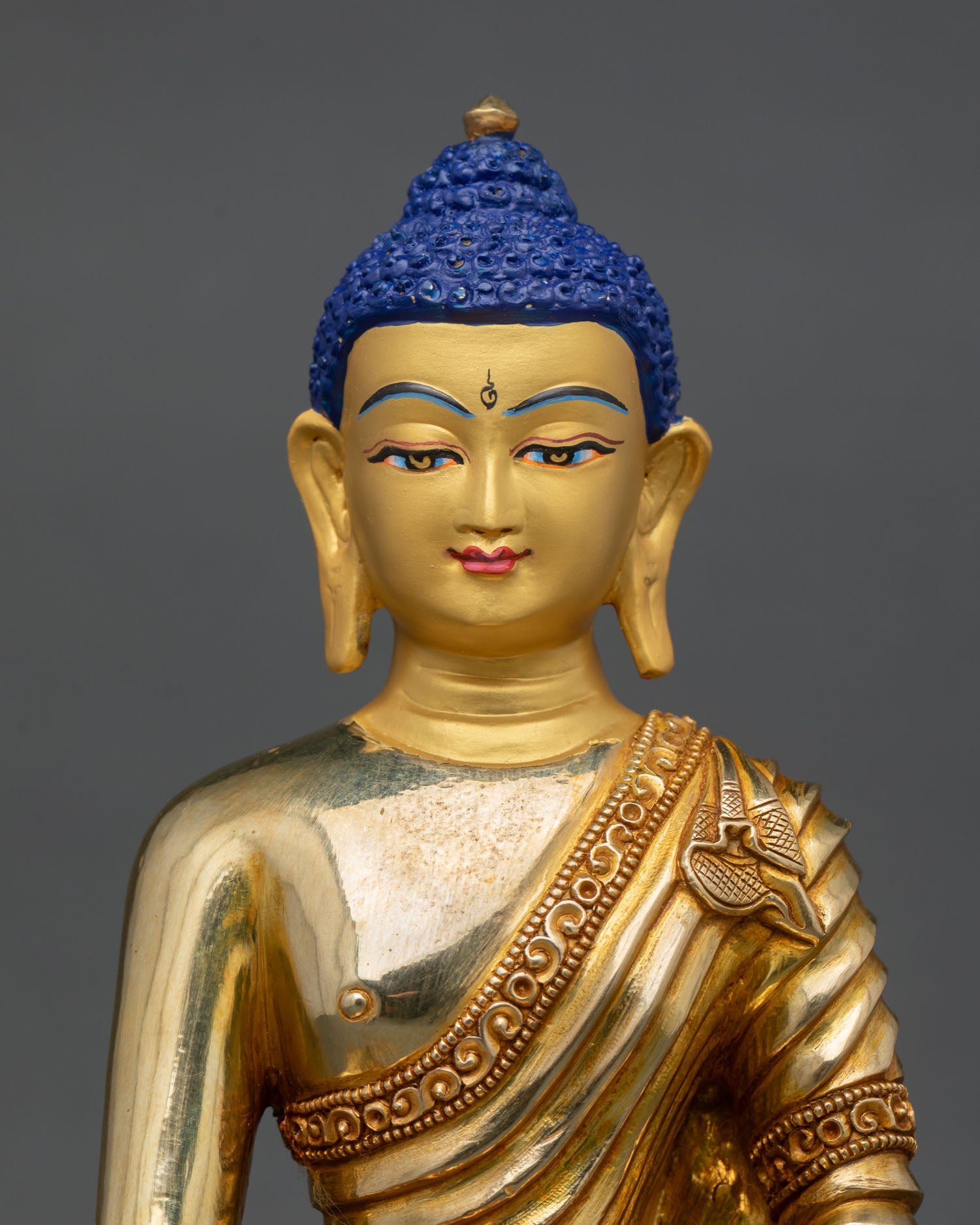 shakyamuni buddha close up detail copper gold fire gilded himalayan newari craft
