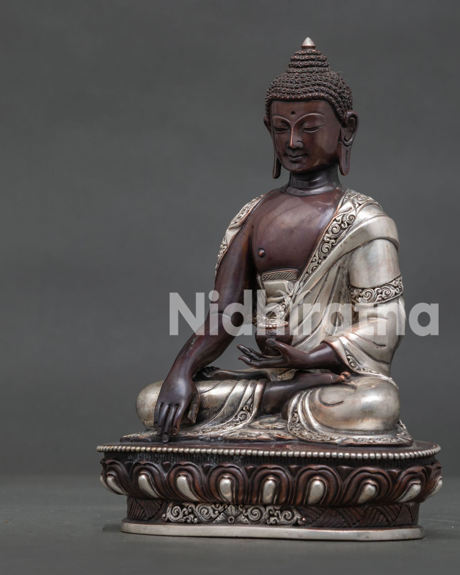 Shakyamuni Buddha Earth Touching Mudra with begging bowl detailed.