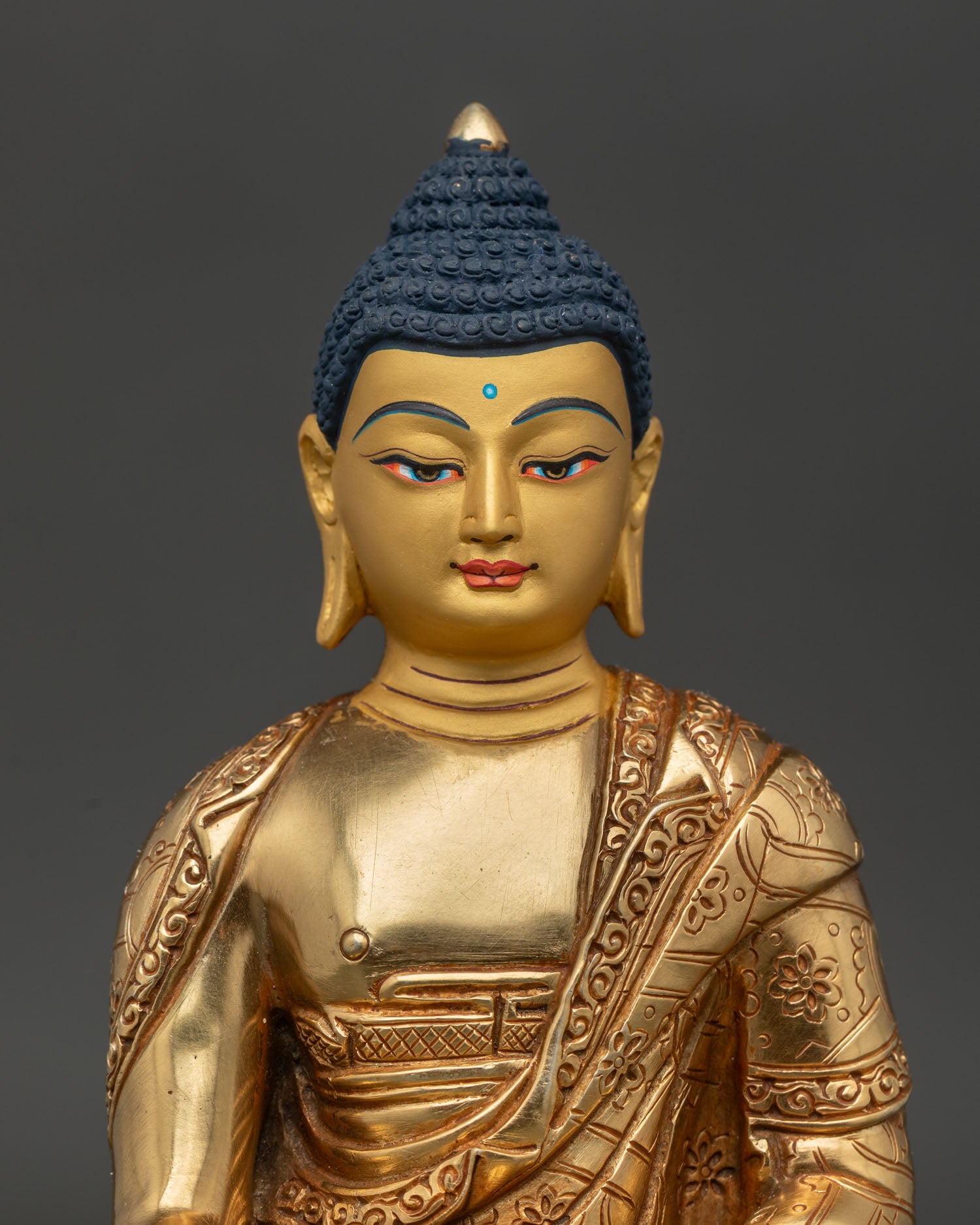 Shakyamuni Buddha Gold Painted Face with Handcarved Floral Robe Close Up Detail.