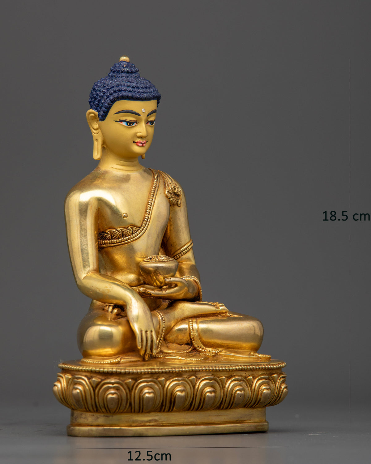 Shakyamuni Buddha sculpture in Bhumisparsha Mudra holding a sacred alms bowl on a detailed lotus pedestal