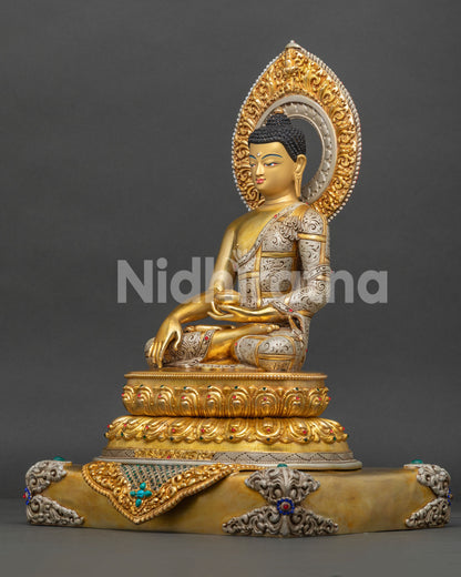 Shakyamuni Buddha sculpture with gold painted face in Bhumisparsha Mudra holding monk's alms bowl