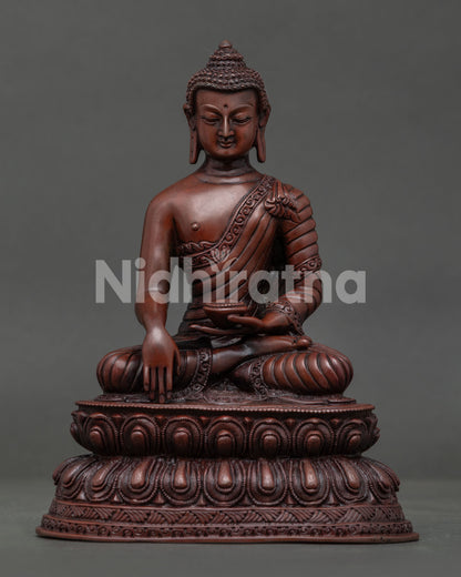 Shakyamuni Buddha seated on double lotus throne with earth touching mudra.