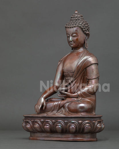 Shakyamuni Buddha seated on lotus throne in earth touching mudra holding begging bowl symbolizing enlightenment.