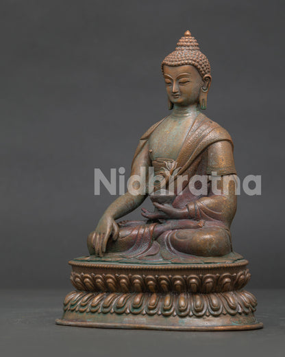 Shakyamuni Buddha showing Bhumisparsha Mudra and monk’s begging bowl.