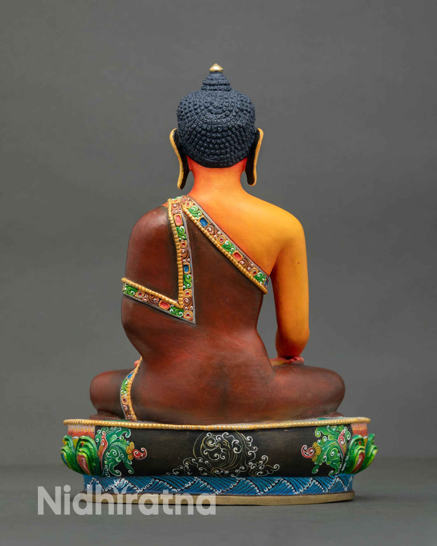 Shakyamuni Buddha statue back view detailed lotus base gold accents traditional Newari handcrafted Buddhist altar decor sacred sculpture