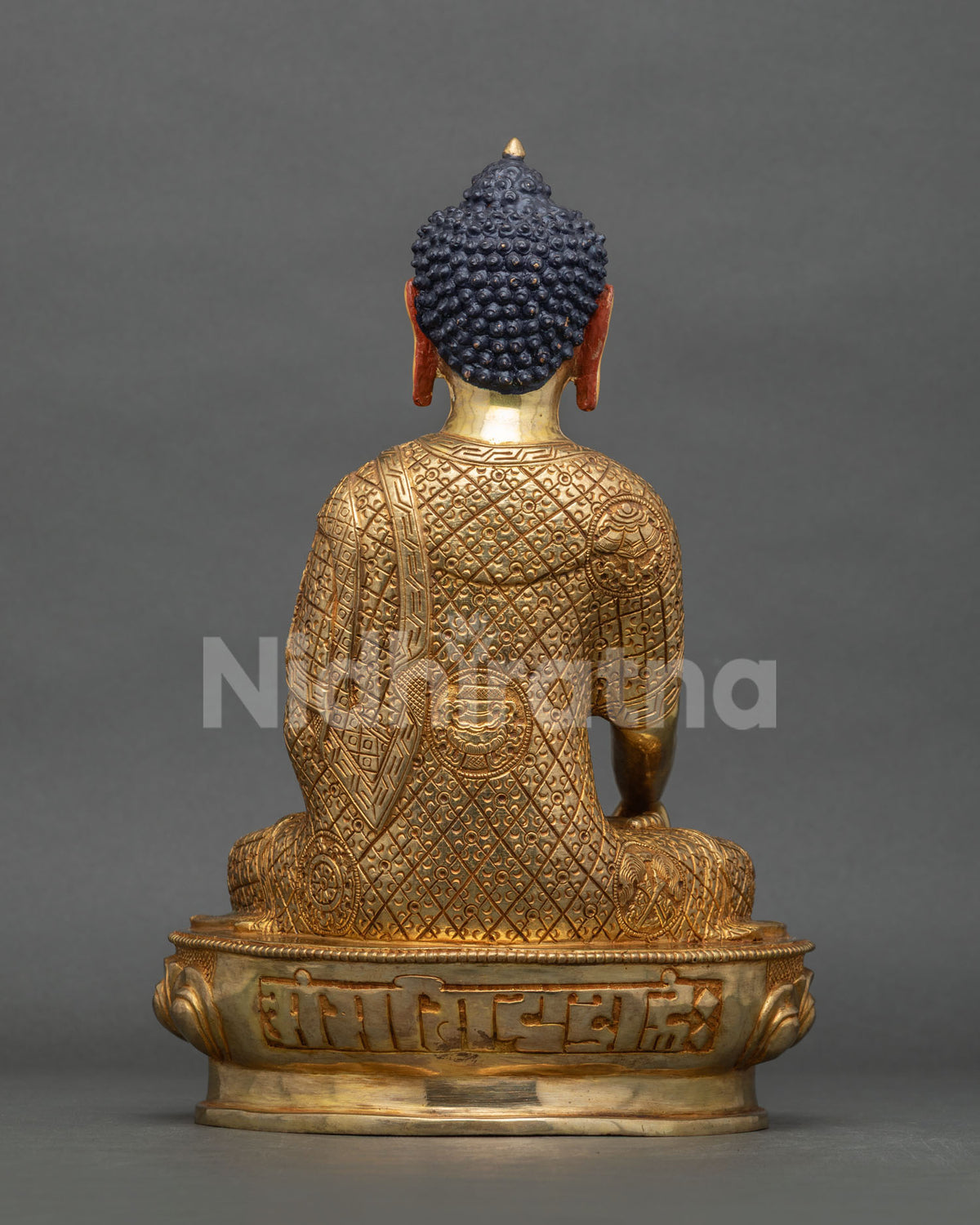 Shakyamuni Buddha statue back view gold fire gilded finish.