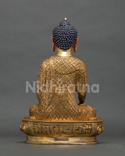 Shakyamuni Buddha statue back view gold fire gilded finish.