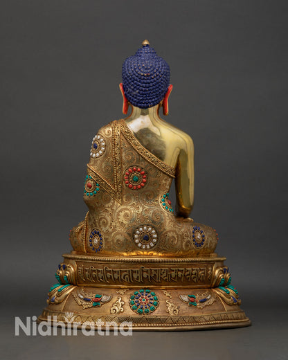 Shakyamuni Buddha statue back view handmade gold gilded copper sculpture with engraved sacred mantras on throne