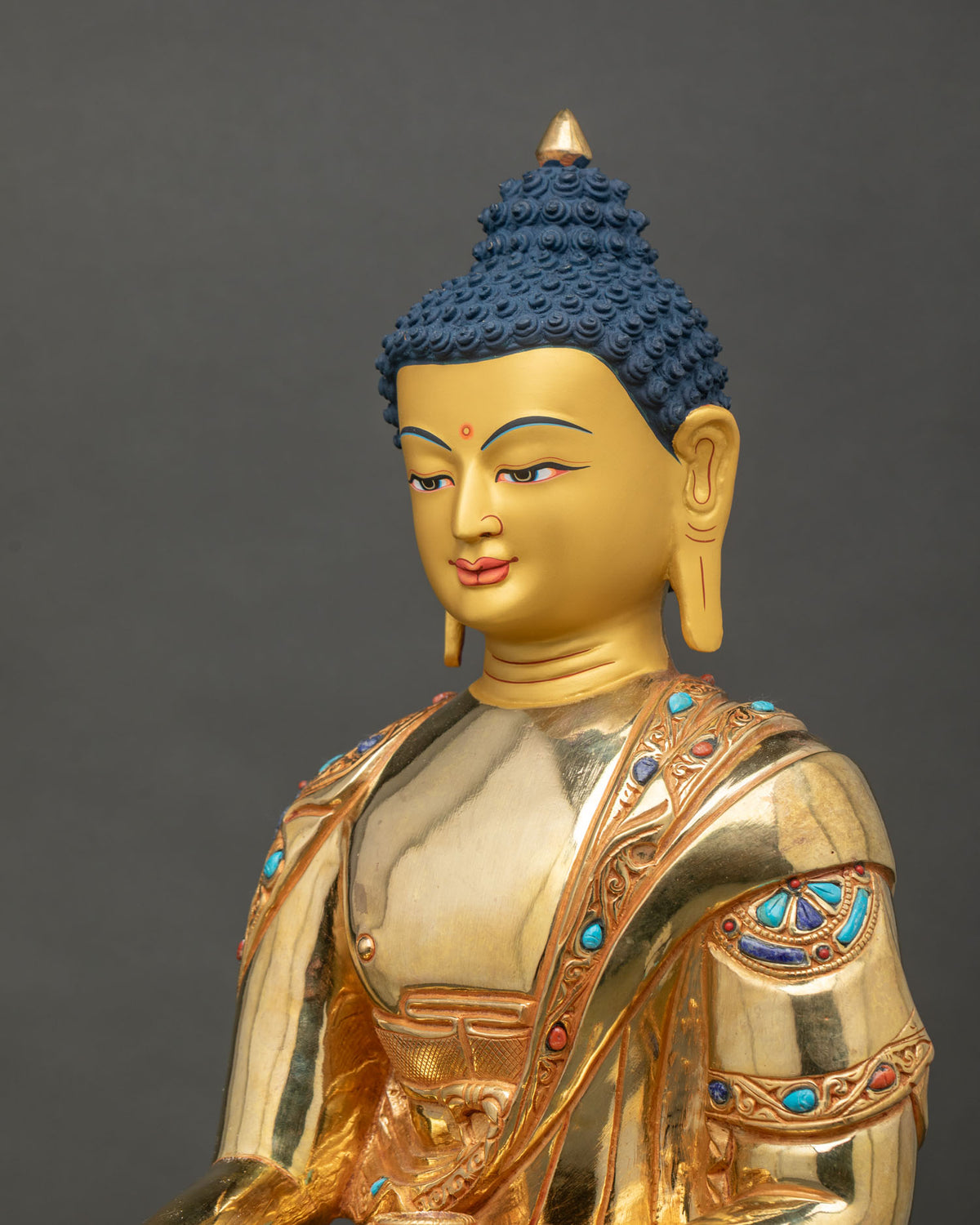 Shakyamuni Buddha statue bhumisparsha mudra monk robe side close up.