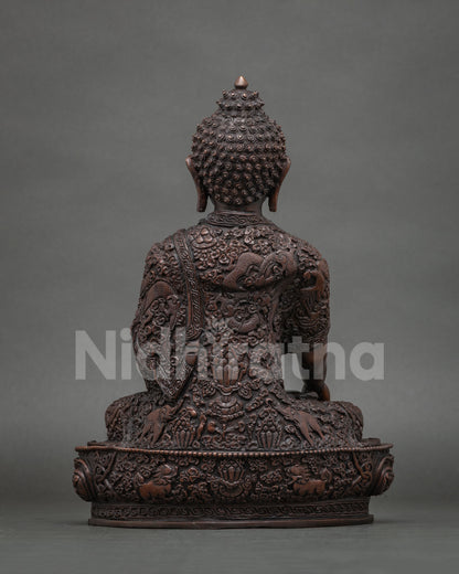 Shakyamuni Buddha statue featuring a hand carved monk robe with floral designs roaming dragon auspicious symbols and celestial elephants.