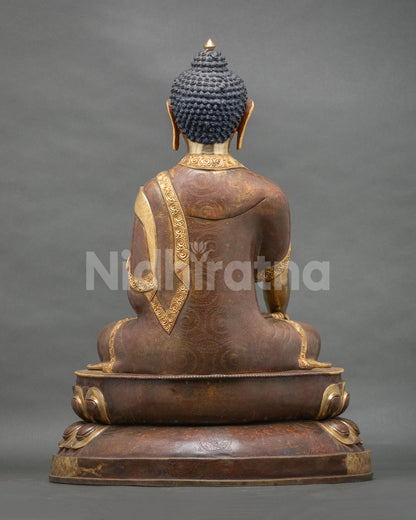 Shakyamuni Buddha statue with chemically oxidized copper patina and traditional Nepalese art.