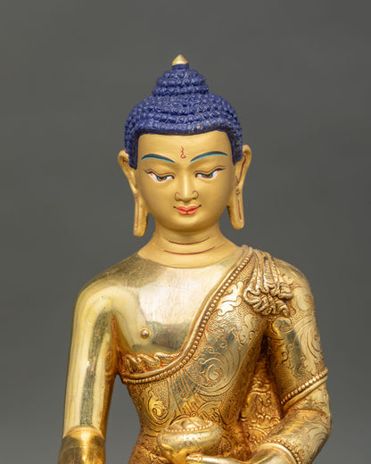 shakyamuni buddha statue close up, handcrafted copper gold fire gilded nepal