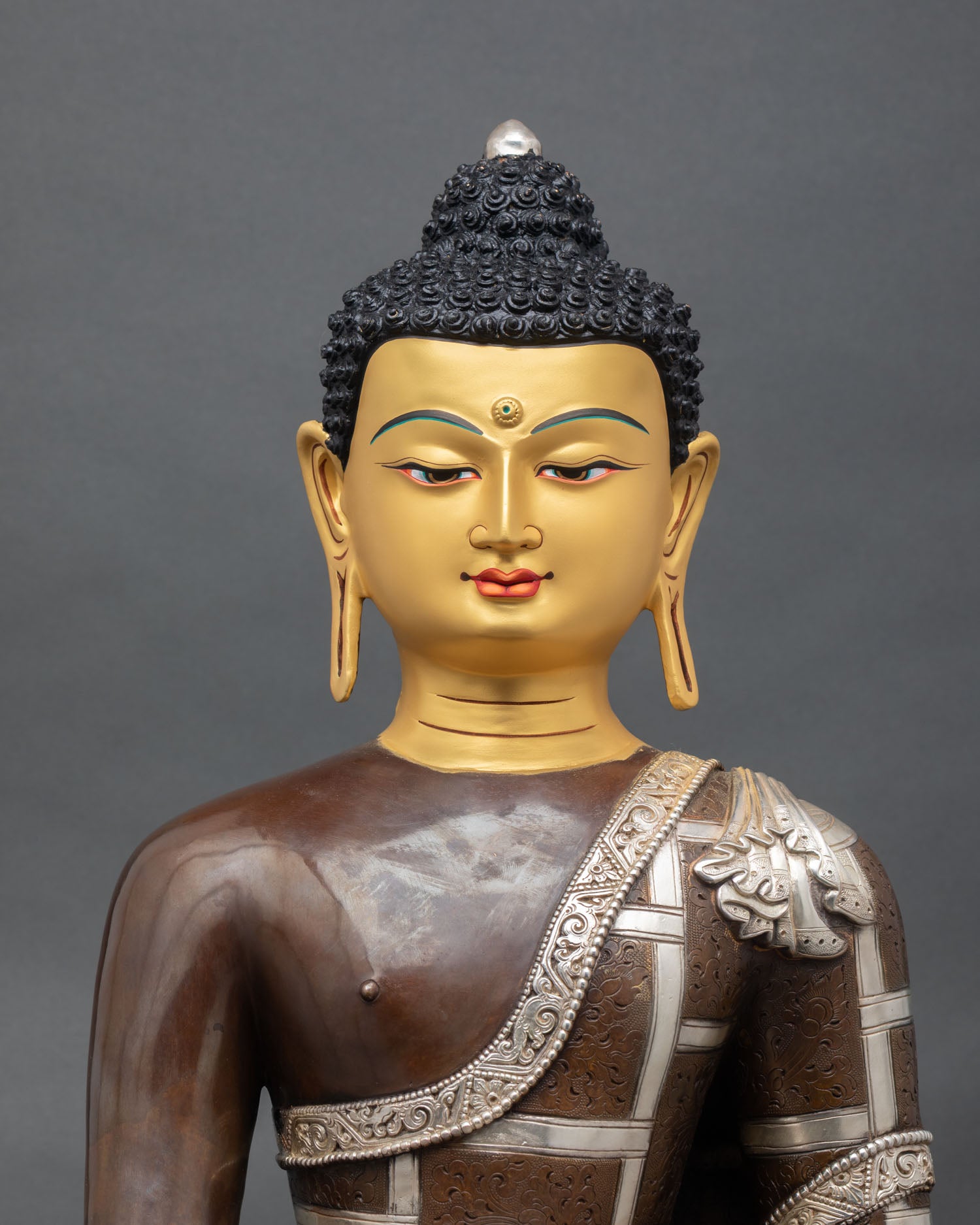 Shakyamuni Buddha statue, close up view, serene enlightened face, himalayan buddhist art