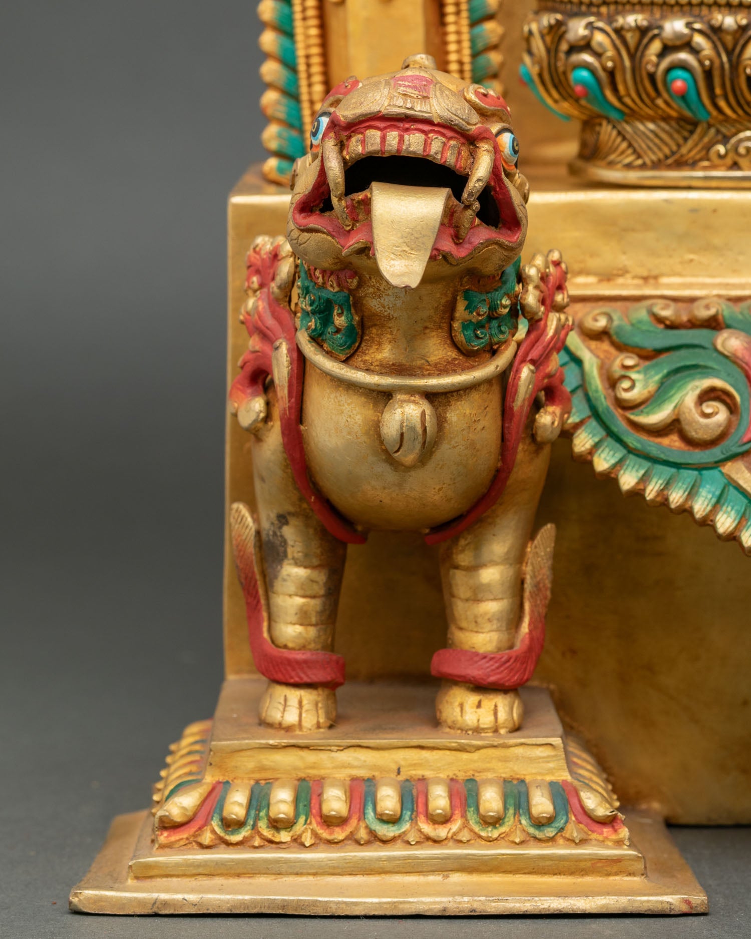 Shakyamuni Buddha statue detailed close-up of snow lions supporting lotus throne