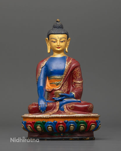 Shakyamuni Buddha statue with Earth Touching Mudra holding sacred patra bowl.