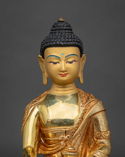 Shakyamuni Buddha statue Face close up 24k gold painted .