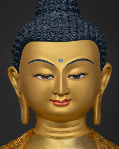Shakyamuni Buddha Statue Face Close Up with 24K Gold Painted Serene Expression