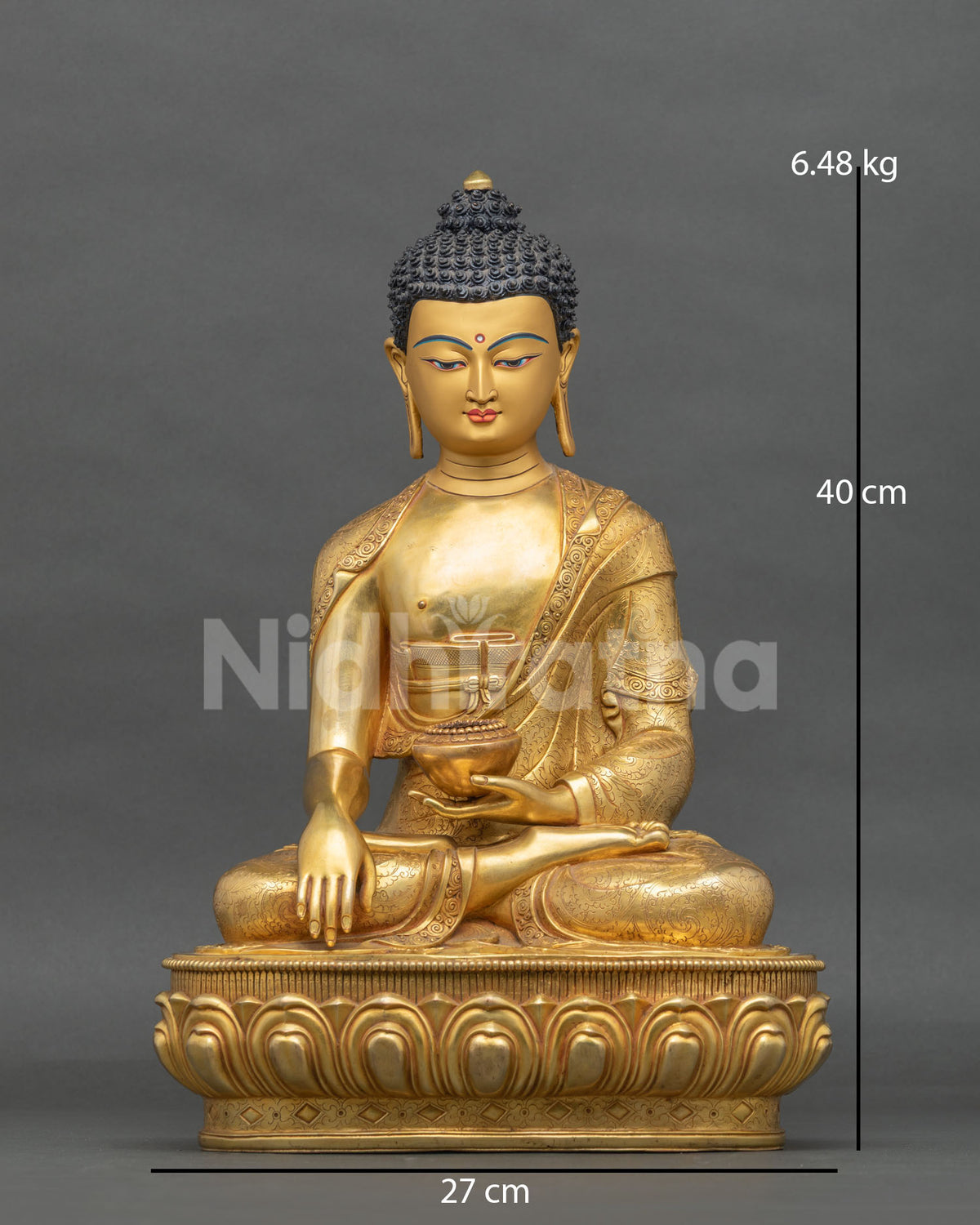Shakyamuni Buddha statue from Nepal in gold fire-gilded copper, front view on lotus pedestal
