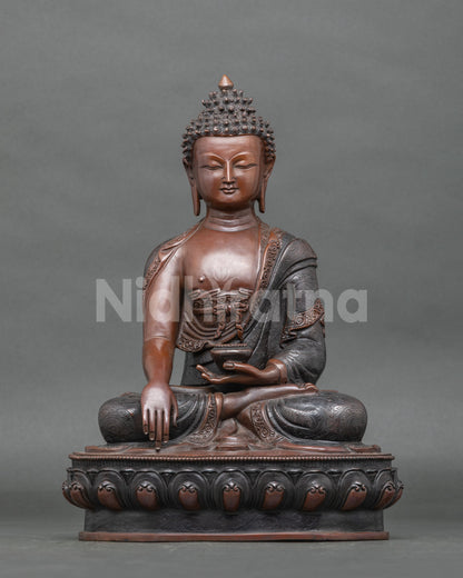 Shakyamuni Buddha statue front view with chemically oxidized copper finish.