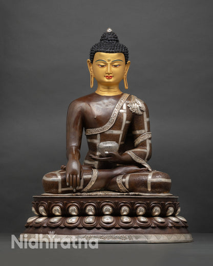 Shakyamuni Buddha statue, front view, double lotus throne, copper sculpture, gold-painted face, oxidized silver finish nepal