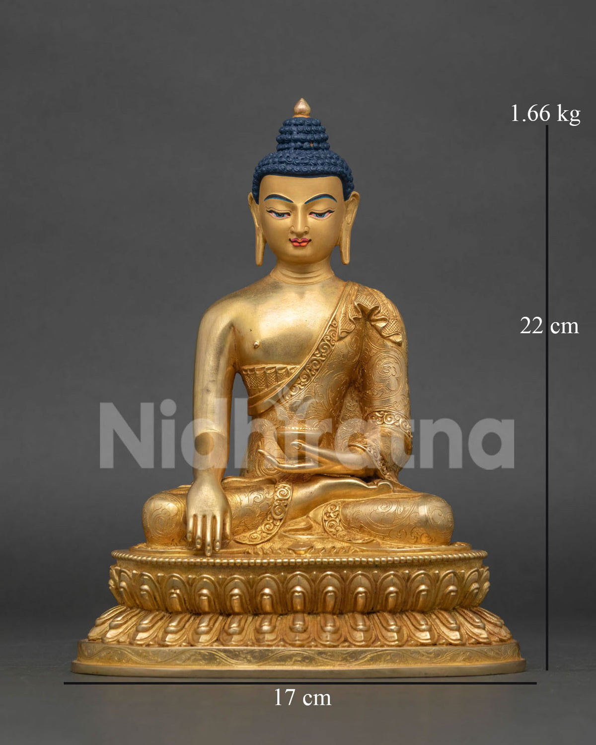Shakyamuni Buddha statue front view gold fire gilded 24k gold face.