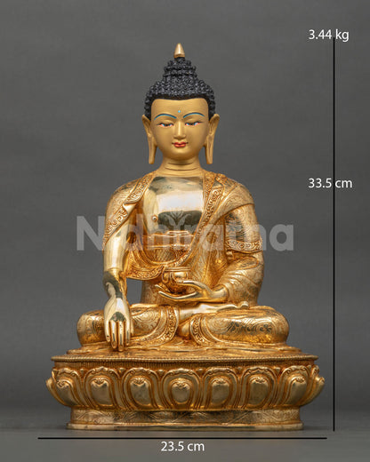 Shakyamuni Buddha statue front view gold fire gilded copper Nepal.