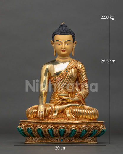 Shakyamuni Buddha statue front view gold gilded copper nepalese sculpture.