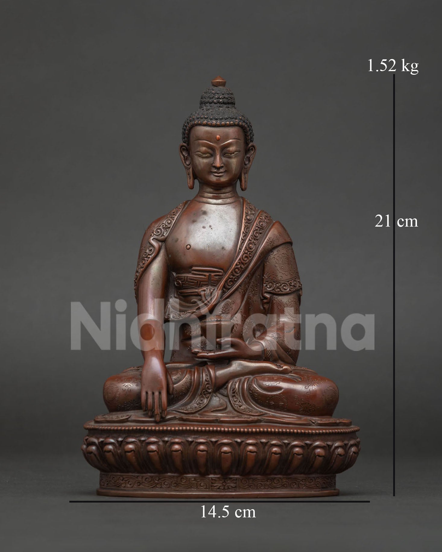 Shakyamuni Buddha statue front view in oxidized copper with lotus pedestal.