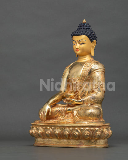 Shakyamuni Buddha statue gold fire gilded copper left side view.