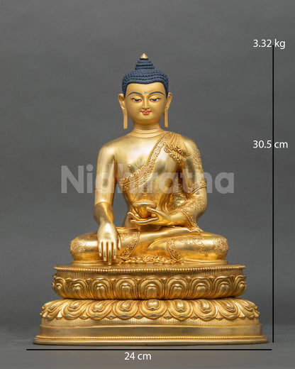 Shakyamuni Buddha statue gold fire gilded copper Nepalese Newari craftsmanship front view.
