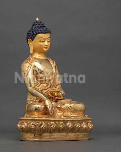 Shakyamuni Buddha statue gold fire gilded copper right side view.