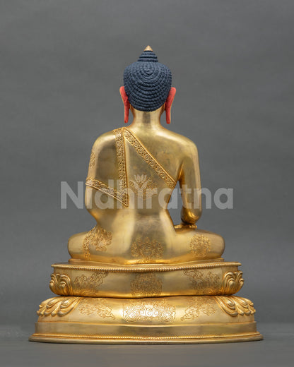 Shakyamuni Buddha statue gold fire gilded copper sculpture back view.