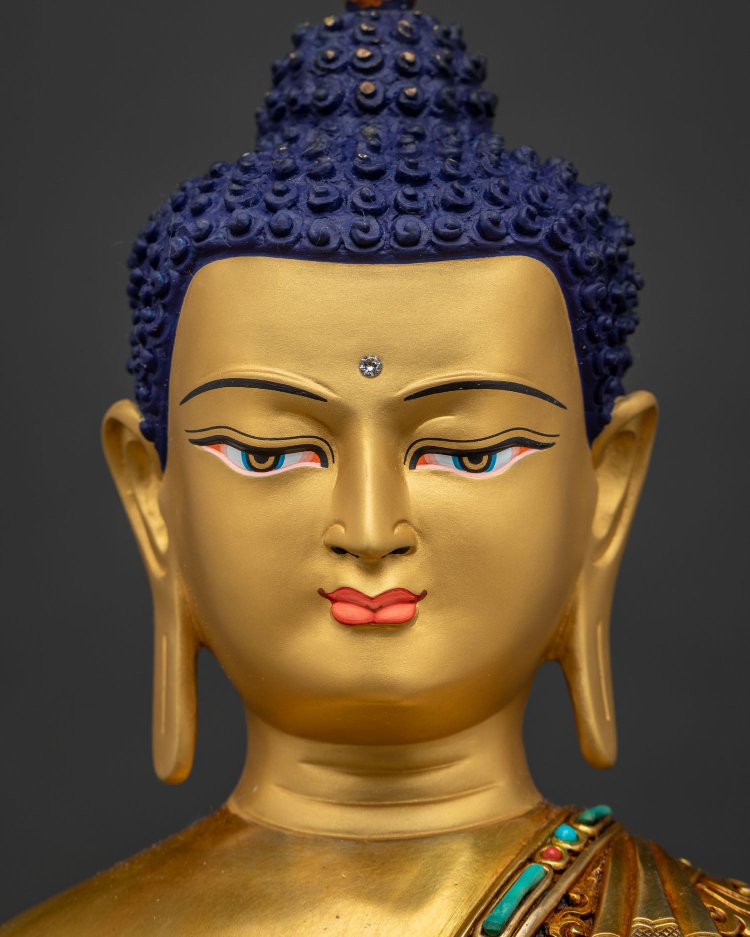 Shakyamuni Buddha statue Florida gold-painted face detailed face close-up view