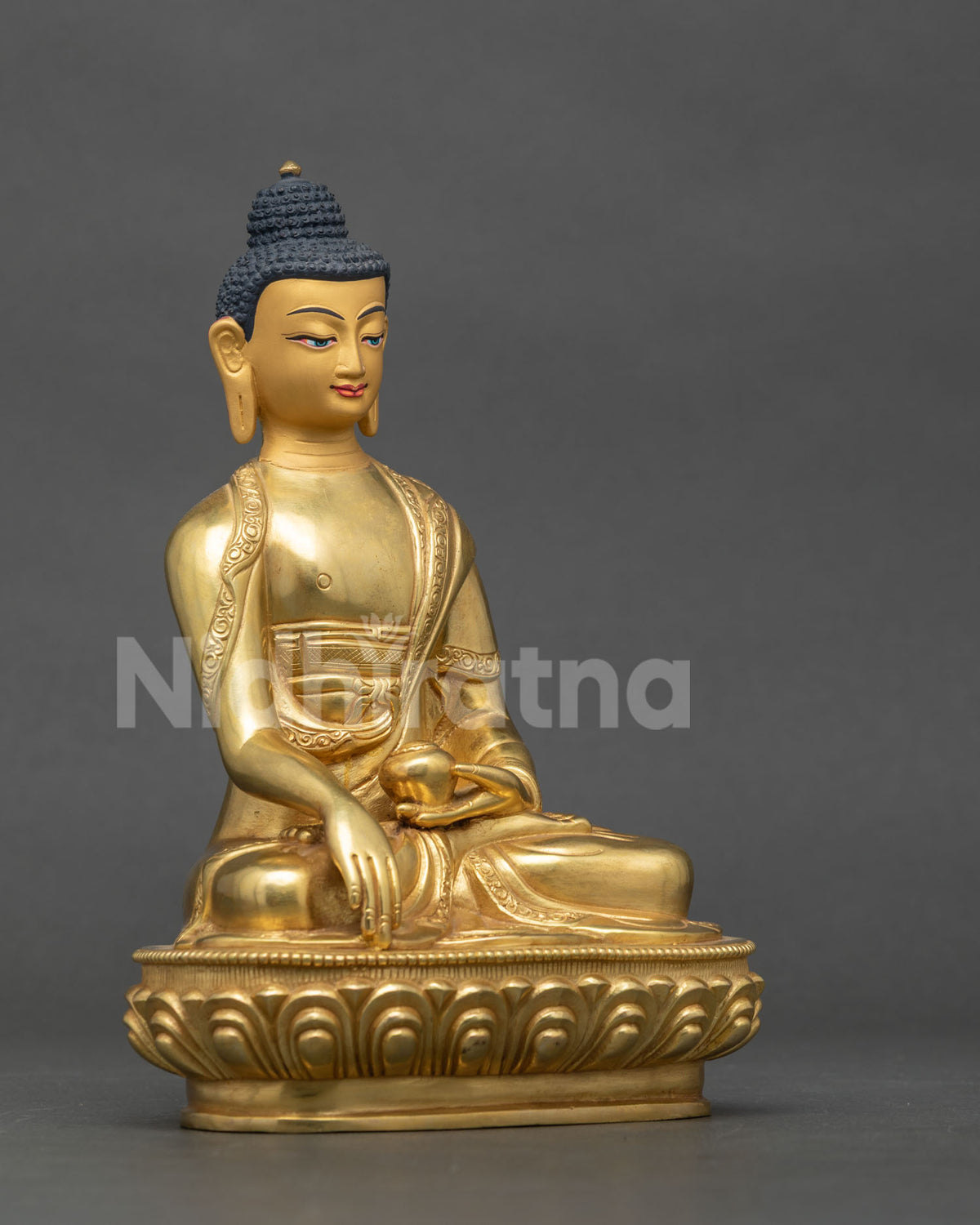 Shakyamuni Buddha statue hand carved lotus pedestal Newari artistry Patan.