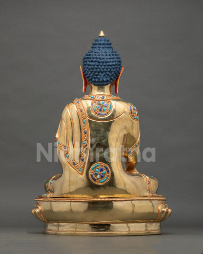 Shakyamuni Buddha statue hand carved monk robe lotus throne back view.