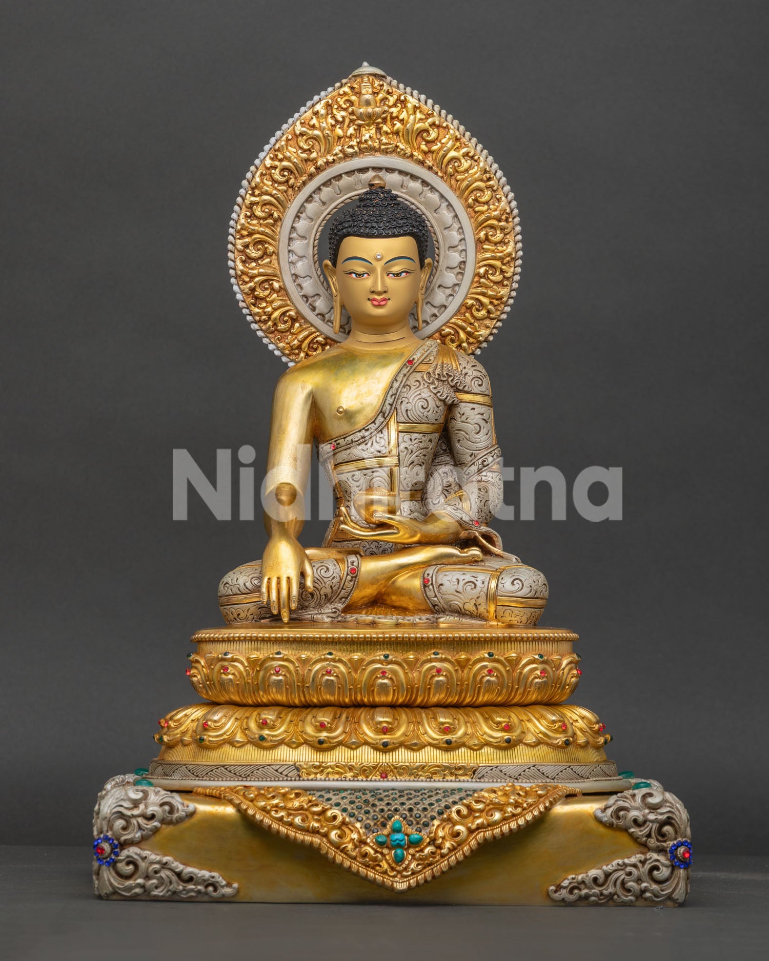 Shakyamuni Buddha Statue handcrafted from copper with 24K gold gilding and semi precious stones from Nepal