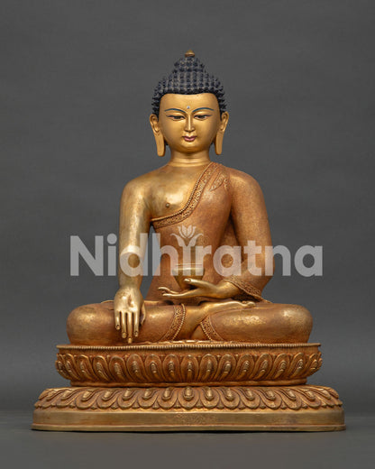 Shakyamuni Buddha statue handcrafted in Nepal with 24K gold gilding and copper lotus throne