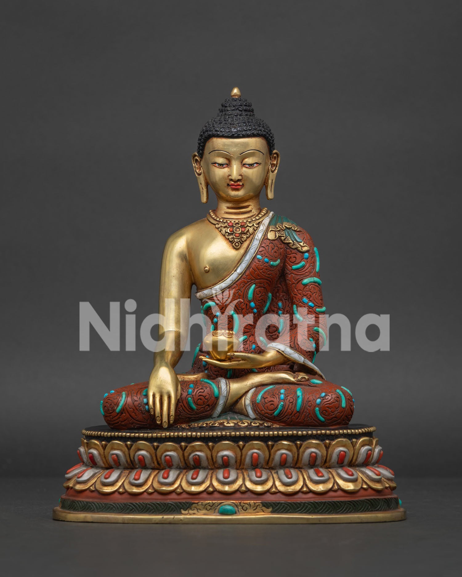 Shakyamuni Buddha Statue handcrafted in Nepal with 24K gold gilding and lotus throne front view