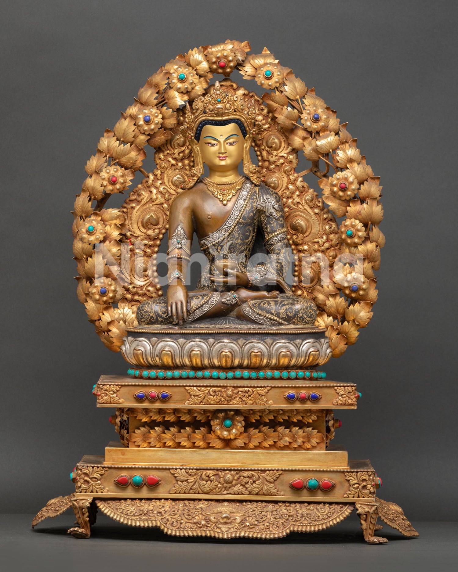 Shakyamuni Buddha Statue, handcrafted in Nepal with gold painted face and ornate throne