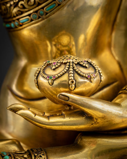 Shakyamuni Buddha statue hands holding alms bowl, detailed 24K gold-gilded close-up