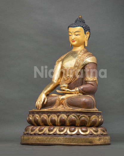 Shakyamuni Buddha statue holding a begging bowl the monastic path.