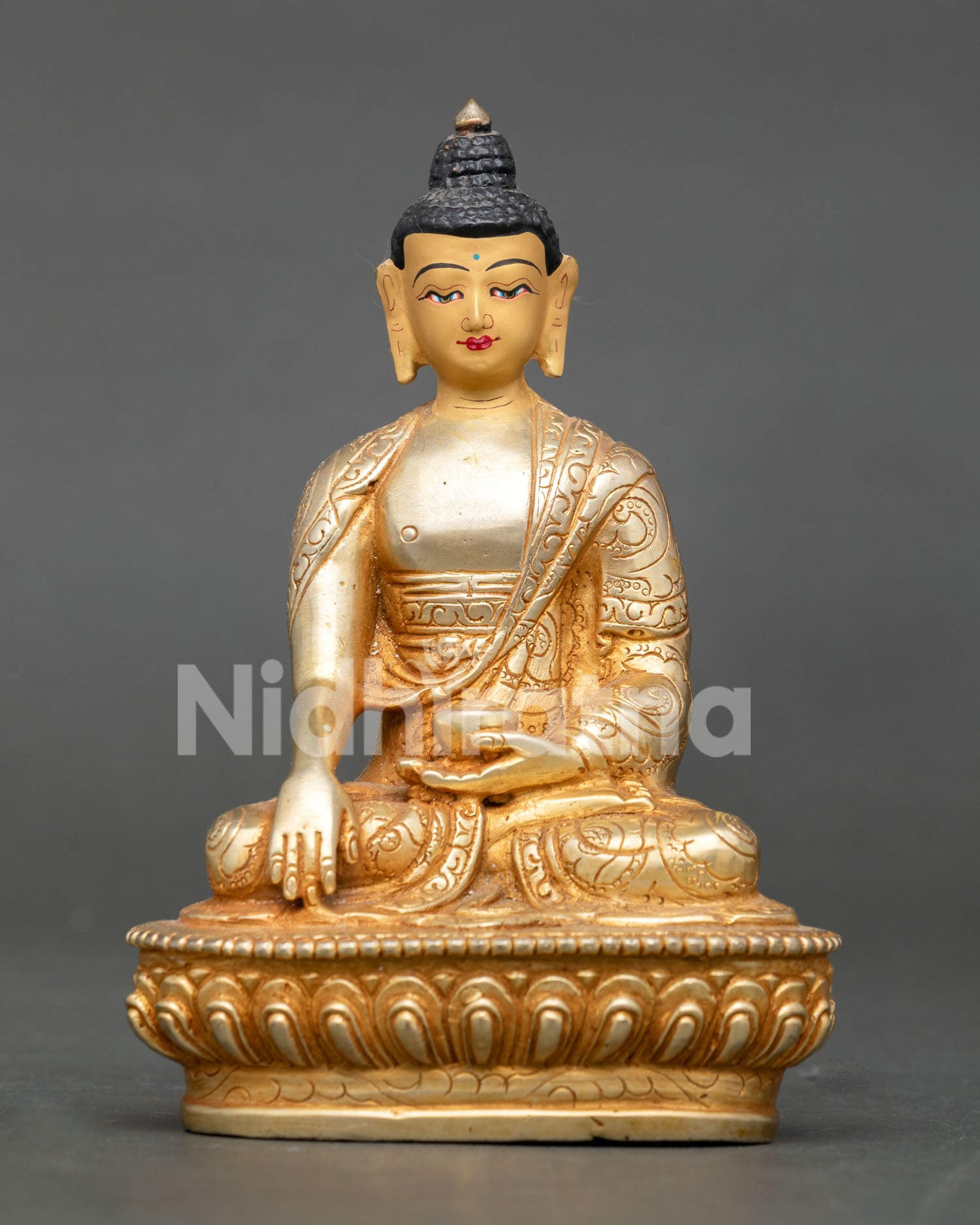 Shakyamuni Buddha Statue in earth touching mudra holding begging bowl on lotus throne.