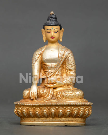 Shakyamuni Buddha Statue in earth touching mudra holding begging bowl on lotus throne.