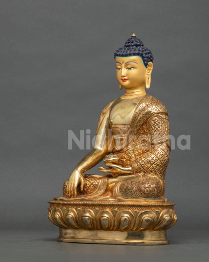 Shakyamuni Buddha statue left side view gold gilded copper.