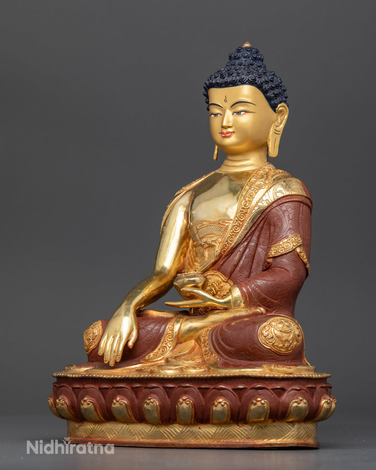 Shakyamuni Buddha Statue left view monastic robe auspicious symbols.