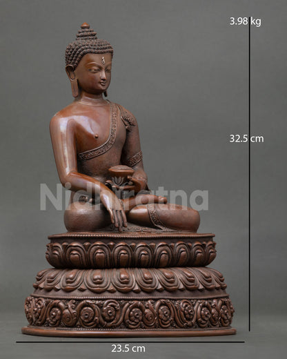 Shakyamuni Buddha statue draped in monastic robes seated on double lotus throne Himalayan Buddhist art Nepal