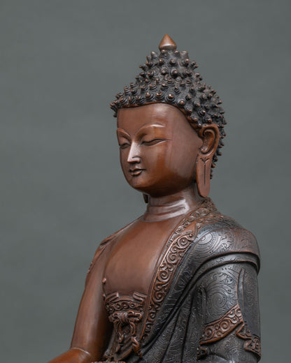 Shakyamuni Buddha statue with oxidized copper patina and traditional Nepalese craftsmanship.