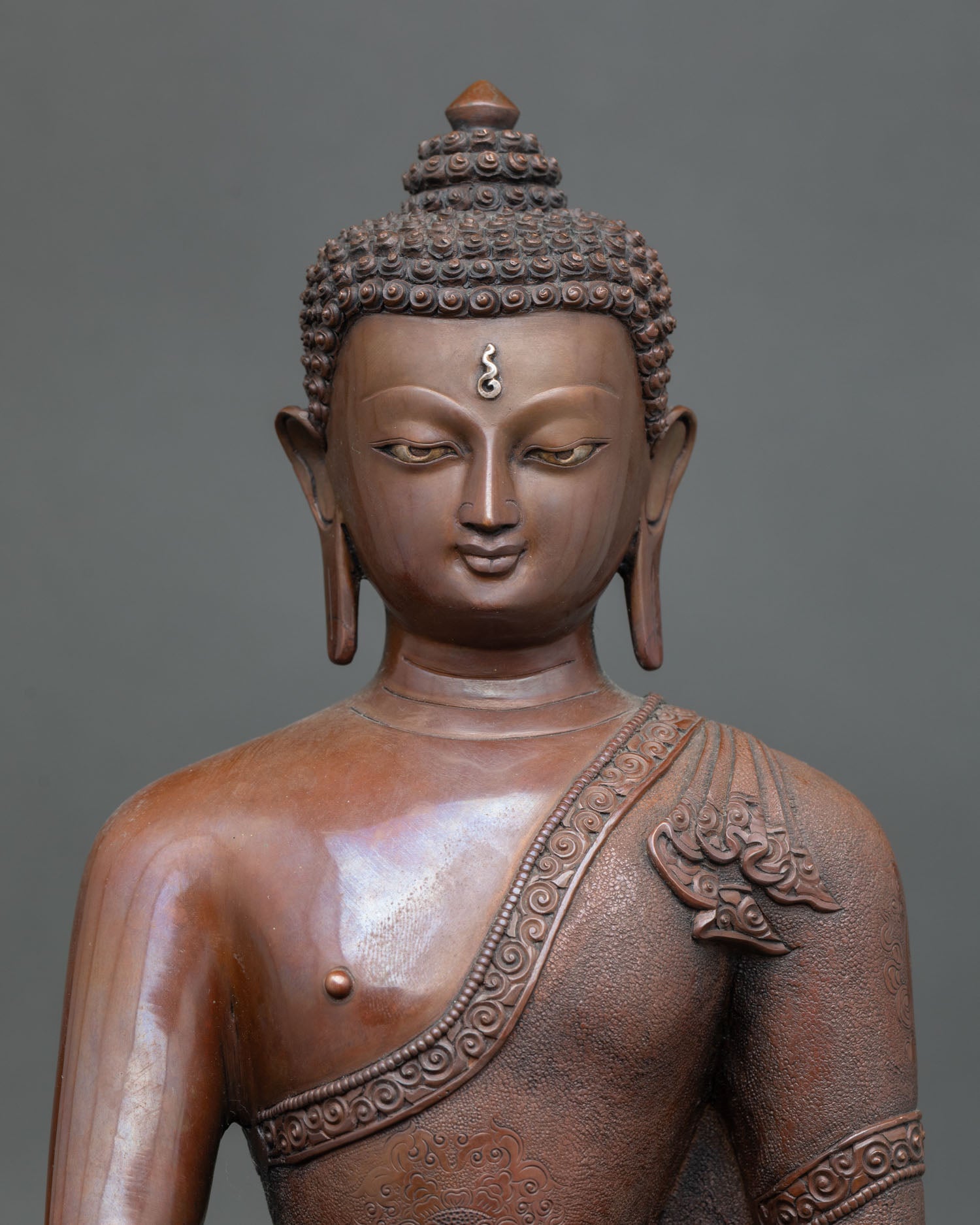 Shakyamuni Buddha statue in oxidized copper sculpture from Nepal