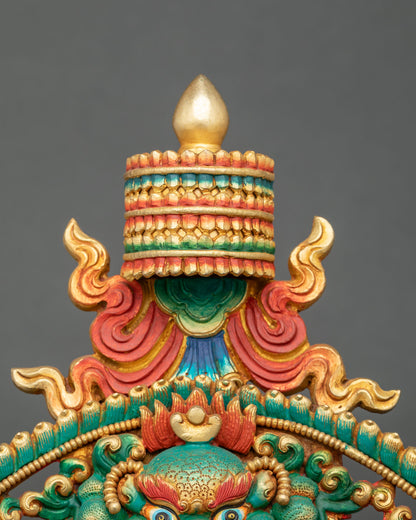 Shakyamuni Buddha statue parasol close-up with tiered ceremonial detailing