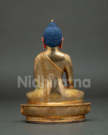 Shakyamuni Buddha statue seated on hand carved lotus pedestal for Buddhist altar.